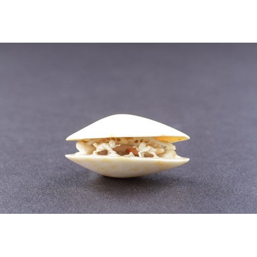 Japanese Carved Ivory Netsuke Depicting the ‘Clam’s Dream’